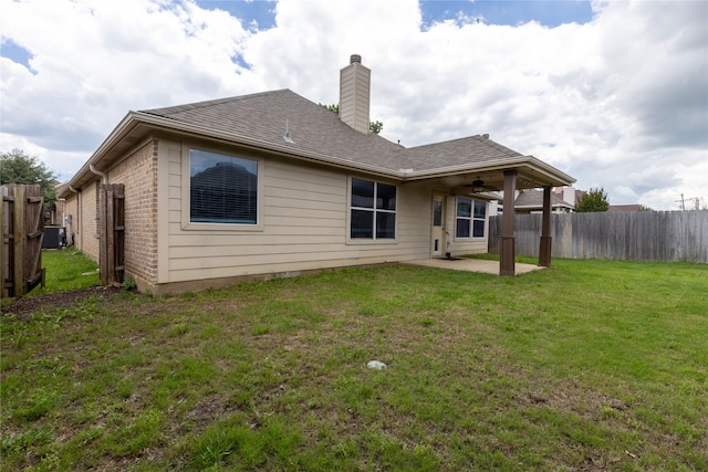 4356 Mountain Crest Dr, Fort Worth, TX 76123 - rear view of house featuring a patio, ceiling fan, a chimney, roof with shingles, and brick siding