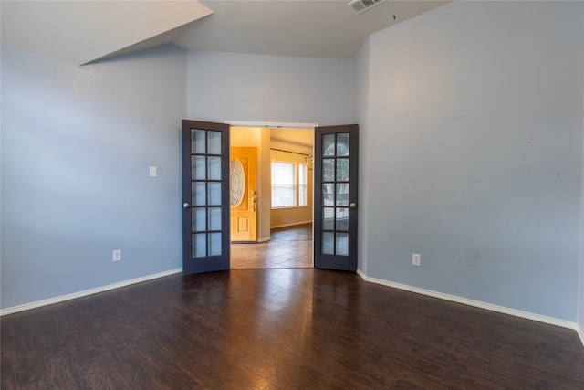4356 Mountain Crest Dr, Fort Worth, TX 76123 - unfurnished room featuring french doors, baseboards, wood finished floors, and a high ceiling