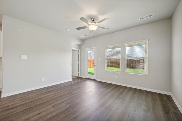 518 Willet Dr, Mckinney, TX 75069 - spare room featuring ceiling fan, dark wood-type flooring, and baseboards