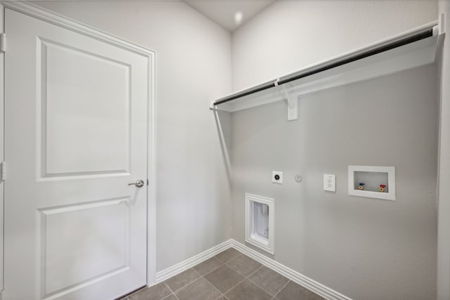 518 Willet Dr, Mckinney, TX 75069 - laundry room featuring hookup for a gas dryer, hookup for an electric dryer, baseboards, hookup for a washing machine, and dark tile patterned floors