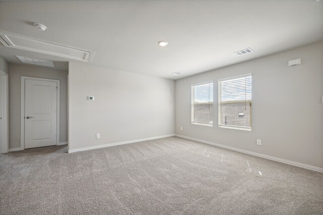 518 Willet Dr, Mckinney, TX 75069 - unfurnished room with attic access, light carpet, baseboards, and a smoke detector