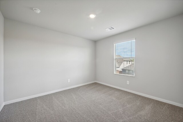 518 Willet Dr, Mckinney, TX 75069 - spare room featuring carpet, baseboards, and a smoke detector