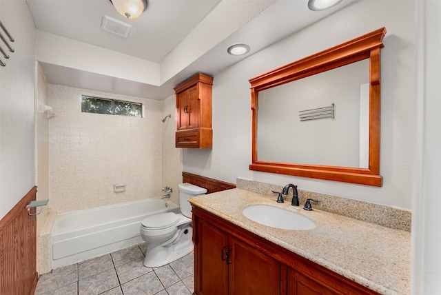 bathroom with toilet, tile patterned floors, shower / tub combination, and vanity