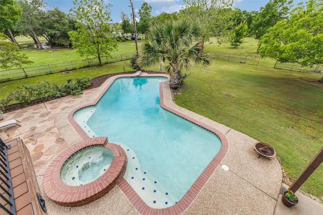 view of pool with an in-ground hot tub