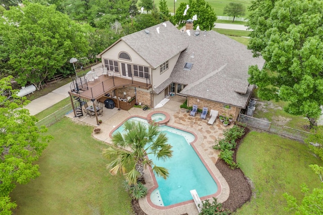 outdoor pool featuring stairs, an in-ground hot tub, a patio, and a wooden deck