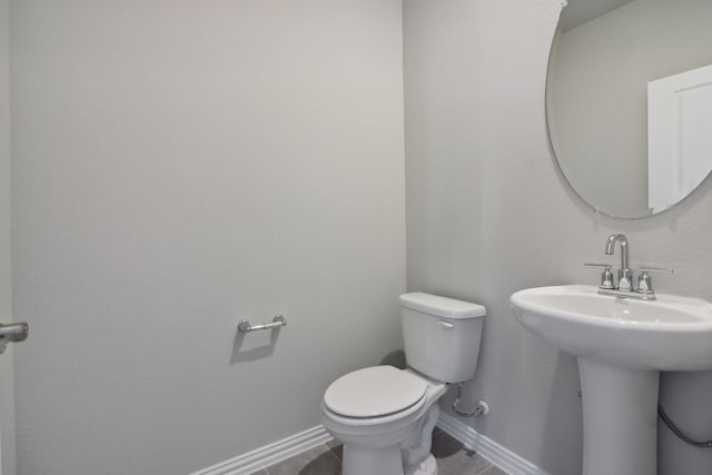 512 Willet Dr, Mckinney, TX 75069 - bathroom featuring toilet and baseboards