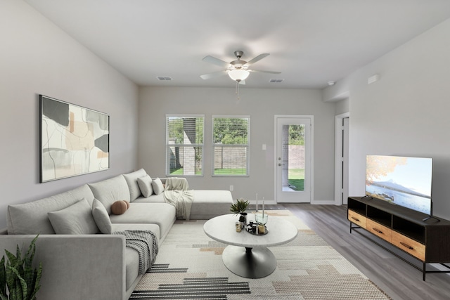 512 Willet Dr, Mckinney, TX 75069 - living area featuring wood finished floors, a ceiling fan, and baseboards