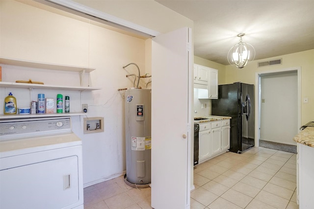 3209 Woodlark Dr, Fort Worth, TX 76123 - laundry area with washer / dryer, electric water heater, a chandelier, light tile patterned floors, and baseboards