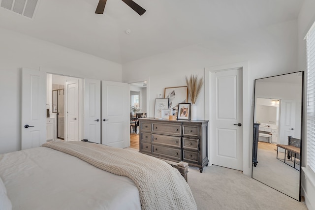 601 Wilderness Point Ln, Anna, TX 75409 - bedroom featuring high vaulted ceiling, light colored carpet, ensuite bathroom, and ceiling fan