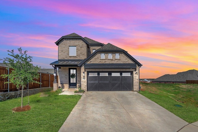 601 Wilderness Point Ln, Anna, TX 75409 - view of front of home with concrete driveway, a standing seam roof, and brick siding