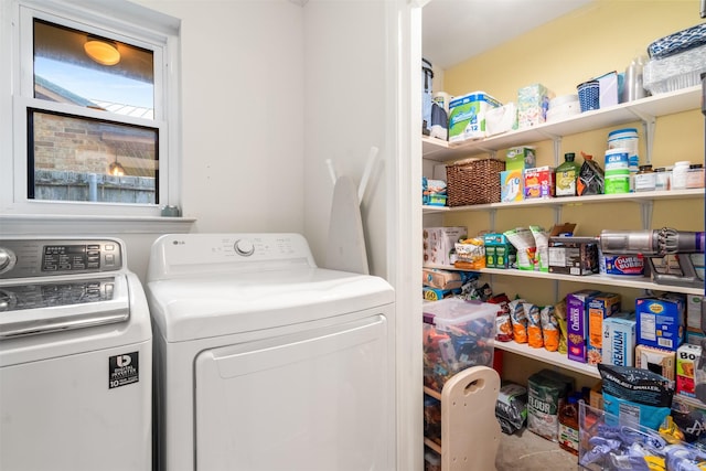 laundry room featuring washer and clothes dryer
