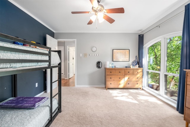 bedroom featuring carpet floors, ceiling fan, and baseboards
