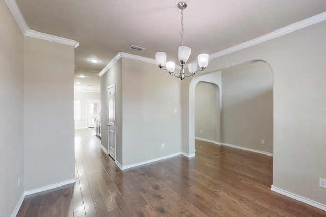 13013 Palancar Dr, Fort Worth, TX 76244 - unfurnished dining area with arched walkways, ornamental molding, a chandelier, dark wood-type flooring, and baseboards