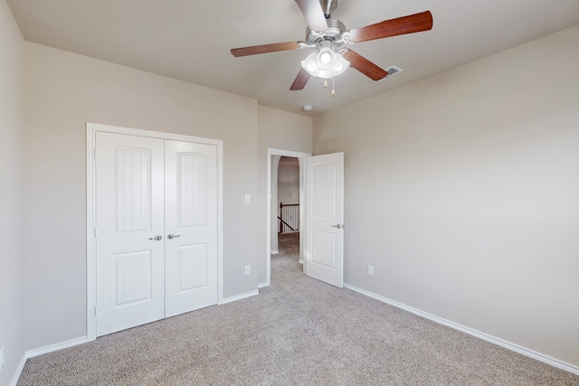 13013 Palancar Dr, Fort Worth, TX 76244 - unfurnished bedroom featuring carpet, a closet, baseboards, and a ceiling fan