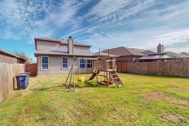 13013 Palancar Dr, Fort Worth, TX 76244 - rear view of house with a playground and a chimney