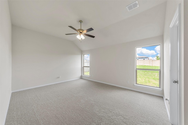 425 Tobin Dr, Seagoville, TX 75159 - carpeted spare room featuring baseboards, lofted ceiling, and a ceiling fan