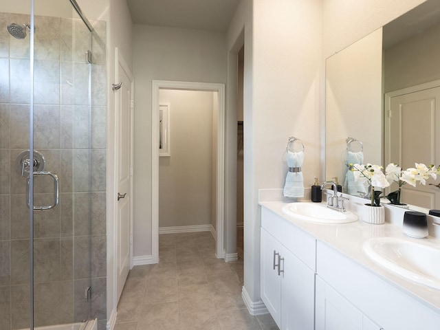 514 Willet Dr, Mckinney, TX 75069 - full bathroom featuring a shower stall, double vanity, and tile patterned floors