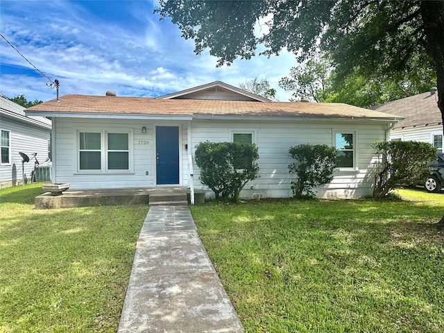 1720 Bagby Ave, Waco, TX 76706 - view of front of house with a front lawn and a porch