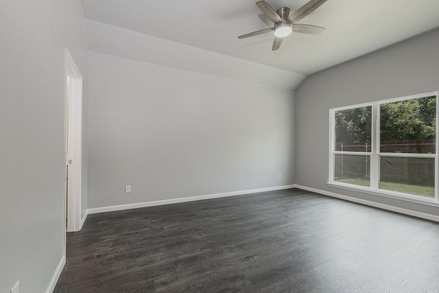 1435 Vine St, Weatherford, TX 76086 - spare room featuring lofted ceiling, a ceiling fan, and dark wood-type flooring