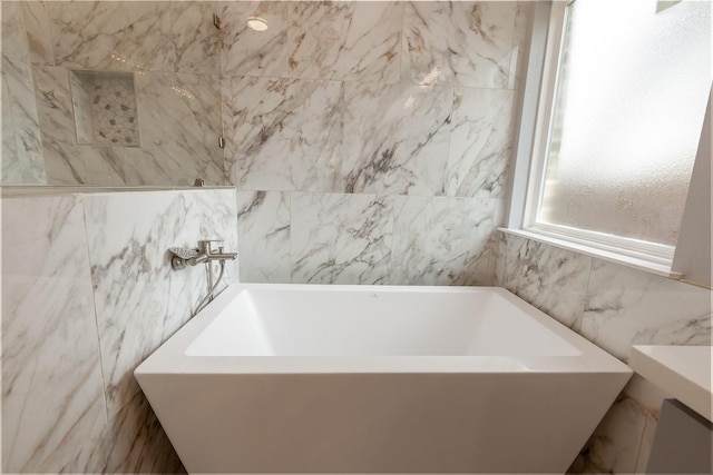 1435 Vine St, Weatherford, TX 76086 - full bathroom featuring tile walls and a freestanding bath