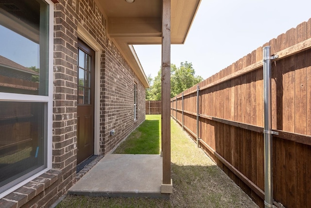 1435 Vine St, Weatherford, TX 76086 - fenced backyard with a patio