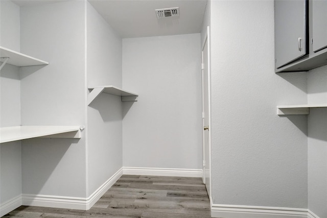 1410 W Torrey St, Granbury, TX 76048 - spacious closet with wood finished floors