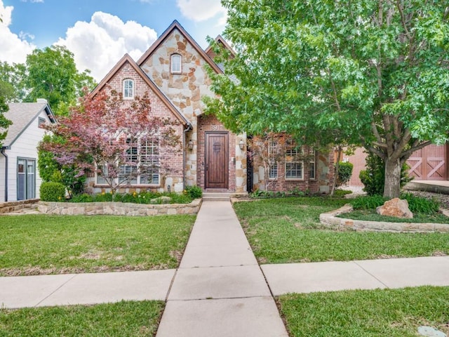 3917 W 6th St, Fort Worth, TX 76107 - view of front of property featuring brick siding and a front yard