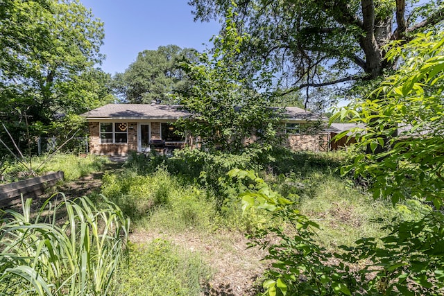 2218 Archer Trl, Denton, TX 76209 - back of property with brick siding