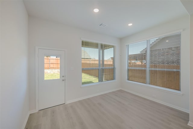 4118 Beale St, Heartland, TX 75114 - unfurnished room featuring light wood finished floors, baseboards, and recessed lighting