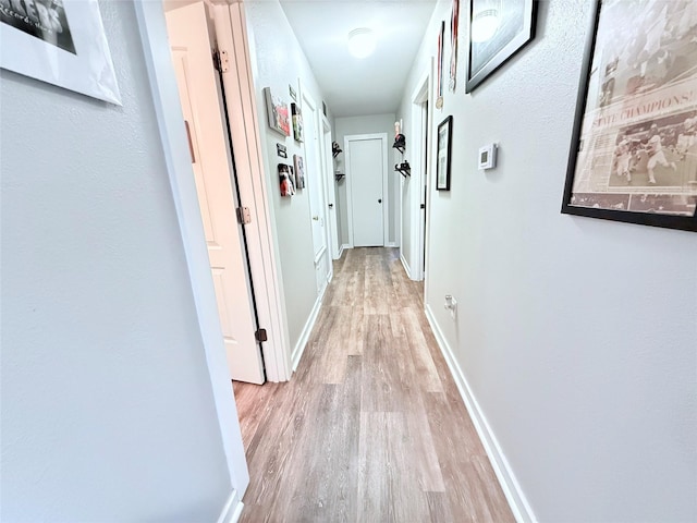 108 Martha Dr, Winnsboro, TX 75494 - hallway featuring wood finished floors and baseboards