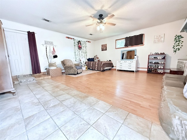 108 Martha Dr, Winnsboro, TX 75494 - living area featuring a ceiling fan and light tile patterned floors