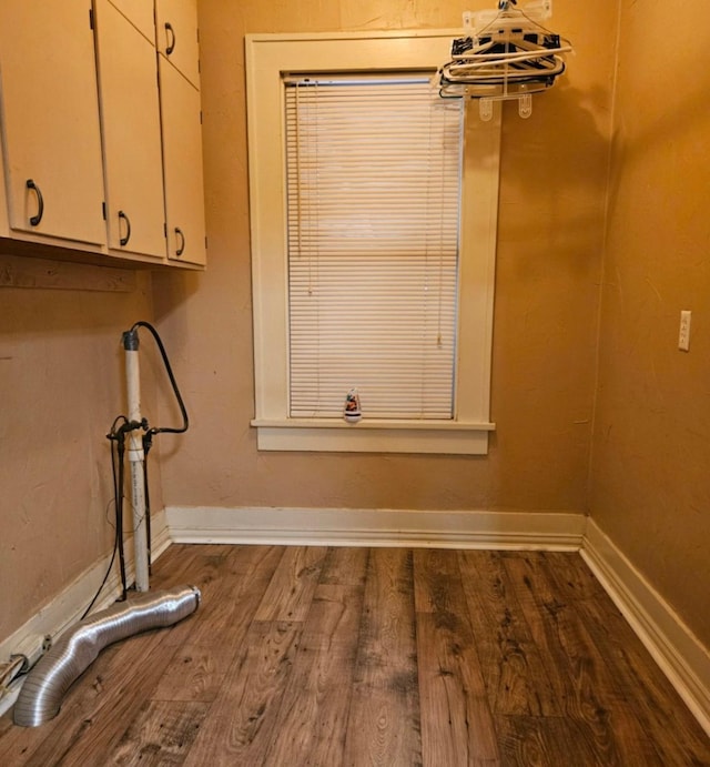 1106 Payne, Olney, TX 76374 - washroom featuring cabinet space, dark wood-style floors, baseboards, and hookup for an electric dryer