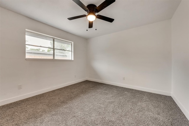 4900 S Drive, Fort Worth, TX 76132 - empty room featuring dark colored carpet, baseboards, and ceiling fan