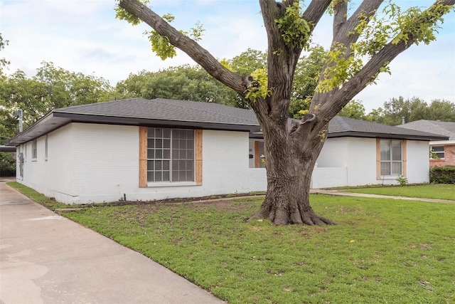 4900 S Drive, Fort Worth, TX 76132 - view of property exterior with brick siding and a lawn