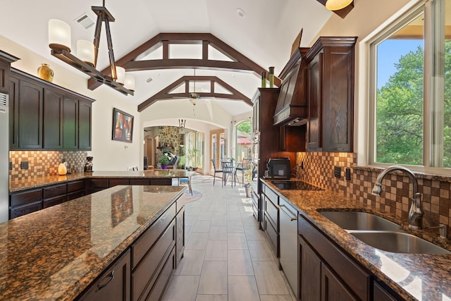 2051 E Oak Shores Dr, Cross Roads, TX 76227 - kitchen with a sink, ceiling fan, arched walkways, healthy amount of natural light, and high vaulted ceiling