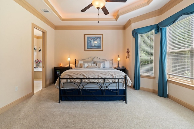 2051 E Oak Shores Dr, Cross Roads, TX 76227 - carpeted bedroom with a tray ceiling, crown molding, multiple windows, ceiling fan, and baseboards