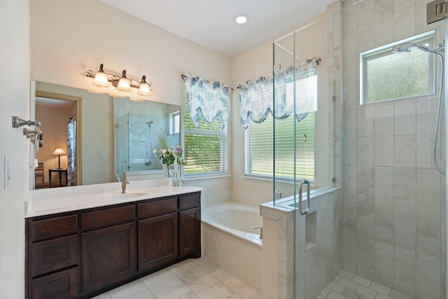 2051 E Oak Shores Dr, Cross Roads, TX 76227 - bathroom featuring a garden tub, a shower stall, vanity, and tile patterned flooring