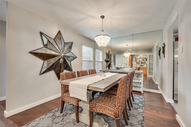 3201 Elizabeth St, Dallas, TX 75204 - dining room featuring a chandelier, baseboards, and dark wood-style floors