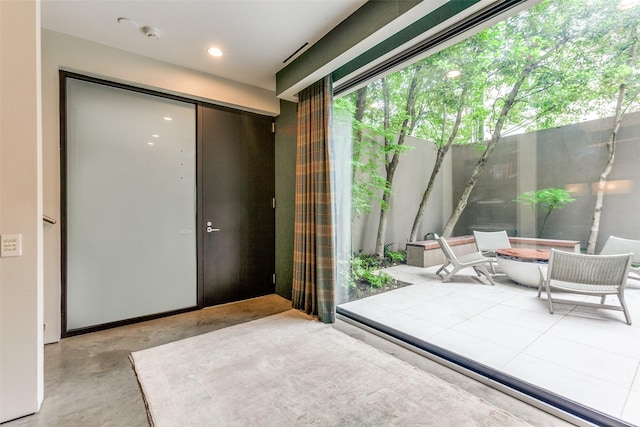 4335 Travis St, Dallas, TX 75205 - entryway featuring finished concrete flooring