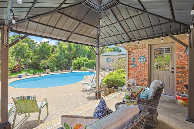 outdoor pool with a patio