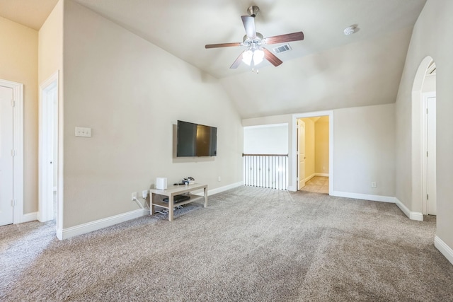 301 Harcourt Ave, Mckinney, TX 75072 - unfurnished living room with a ceiling fan, carpet floors, lofted ceiling, and baseboards