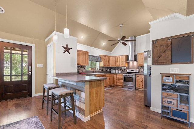 11240 County Road 102, Grandview, TX 76050 - kitchen featuring appliances with stainless steel finishes, wall chimney range hood, a peninsula, dark countertops, and backsplash