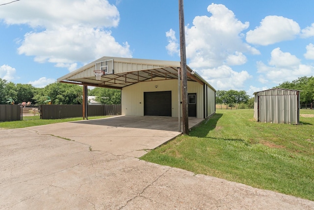 11240 County Road 102, Grandview, TX 76050 - view of home's exterior featuring an outdoor structure, a detached garage, and driveway