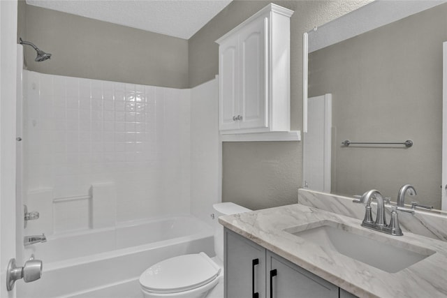 2532 Nogales Dr, Fort Worth, TX 76108 - bathroom with toilet, vanity,  shower combination, a textured ceiling, and a textured wall