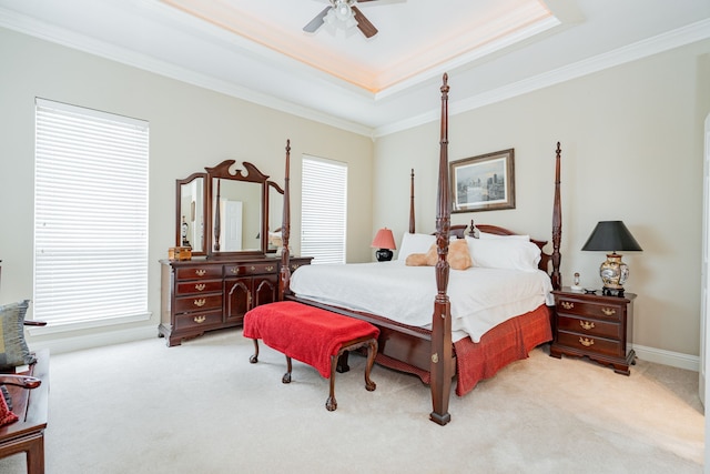 120 Saint Francis Ln, Mabank, TX 75156 - bedroom with a tray ceiling, ornamental molding, light colored carpet, multiple windows, and ceiling fan