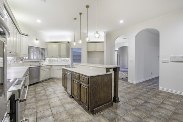 124 Fm 2450, Krum, TX 76249 - kitchen with stainless steel dishwasher, arched walkways, a sink, a breakfast bar area, and ornamental molding