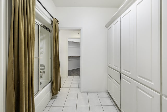 124 Fm 2450, Krum, TX 76249 - full bath with shower / bath combination with glass door, tile patterned flooring, baseboards, and a closet
