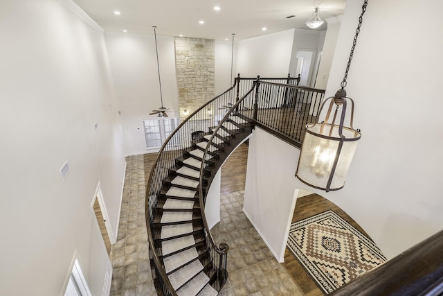124 Fm 2450, Krum, TX 76249 - staircase featuring recessed lighting, ceiling fan, crown molding, and baseboards