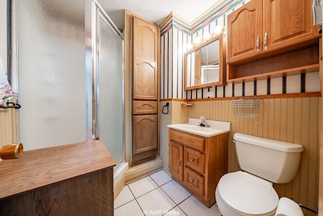 2302 13th, Brownwood, TX 76801 - full bath with toilet, a stall shower, tile patterned flooring, and vanity