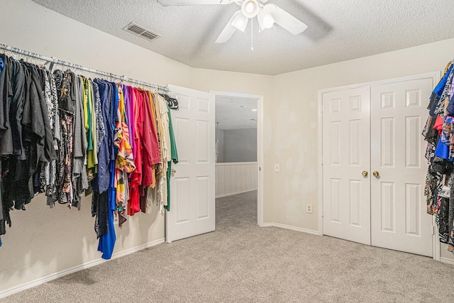 6204 Pennsylvania Ave, Arlington, TX 76017 - spacious closet featuring carpet flooring and a ceiling fan